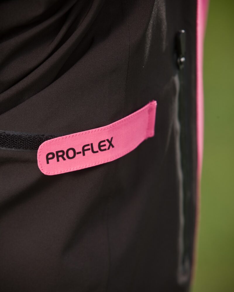 A side adjustor tab on the ProQuip ProFlex ladies golf rain jacket