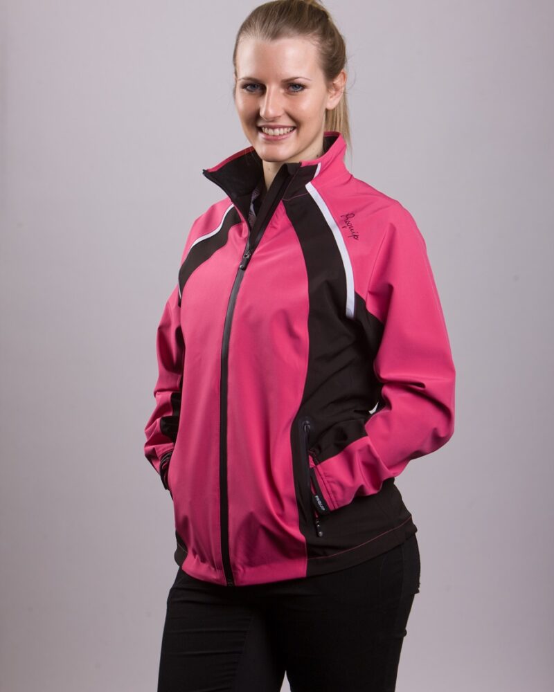 A blonde-haired, blue eyed, lady golfer wearing a ProQuip ProFlex Ladies golf rain jacket